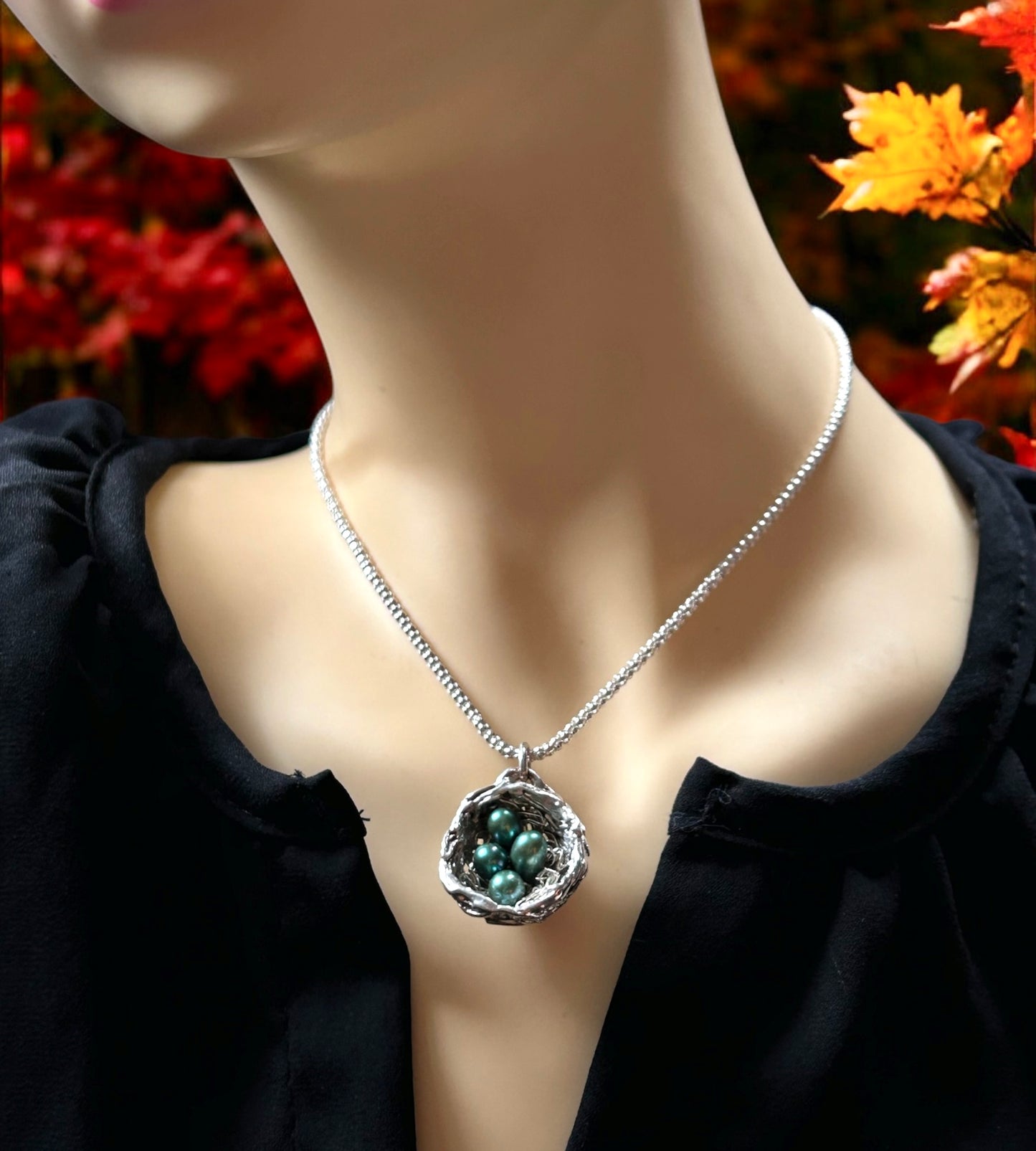 Bird’s nest pendant necklace