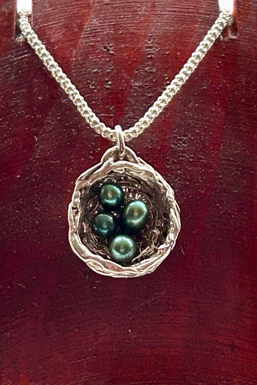 Bird’s nest pendant necklace